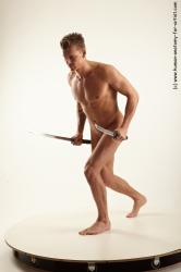 Nude Fighting with sword Man White Athletic Short Blond Realistic